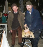 Loughie and Stephen continuing work on the shaping of the hull. Photo: Douglas Cecil